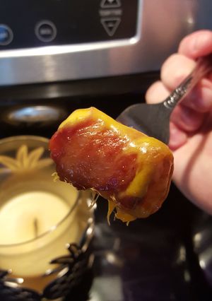 A picture of Cheesy bacon wrapped tots.