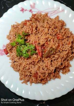 A picture of Tomato Rice in Cooker.
