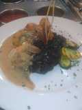 Langostinos con risotto marea negra