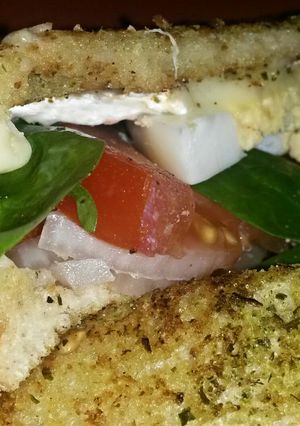 A picture of Sig's Goats Brie, Egg and Tomato griddle Sandwich.