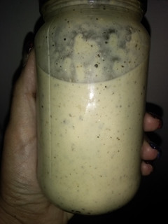 A picture of Momma's Parmesan peppercorn pizza sauce (can be used as Alfredo with less pepper).