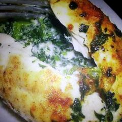 A picture of Cajun Chicken Stuffed with Spinach.
