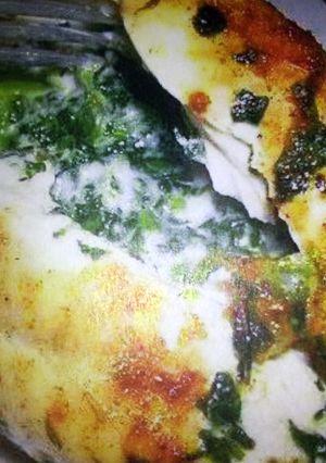 A picture of Cajun Chicken Stuffed with Spinach.