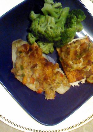 A picture of Flounder and/or Salmon topped with shrimp and crab mixture..