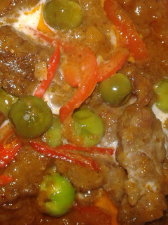 A picture of Panang beef or beef in red curry peanuts sauce.