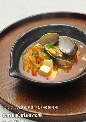 A picture of Kimchi Soup with Tofu and Asari or Manila Clams.