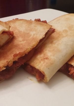 A picture of Chicken tikka masala quesadilla.