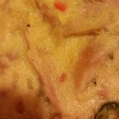 A picture of Chicken and Vegetable Polenta with Artichoke Hearts.