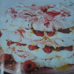 A picture of Raspberry meringue stack cake.