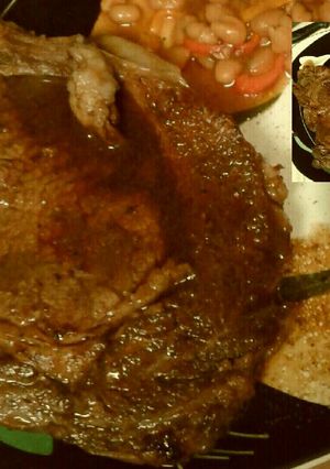 A picture of Pan seared marinated Rib Eye Steak.