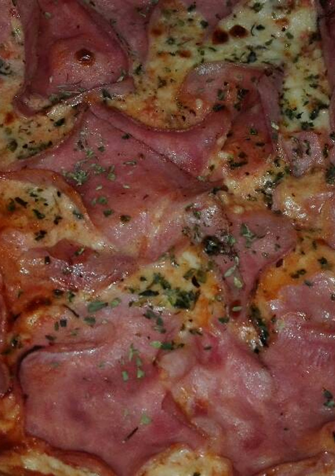 Una foto de Pizza jamón york