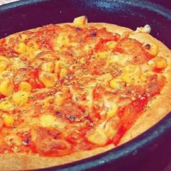 A picture of Corn pizza.