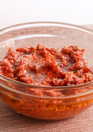 Una foto de Pesto rojo de pistachos