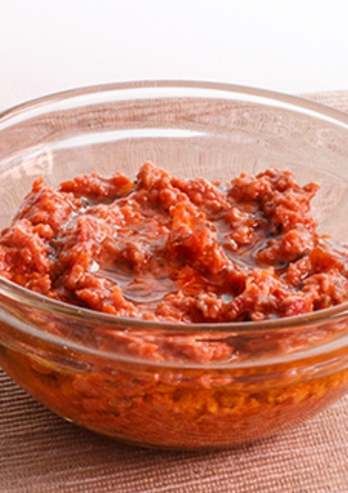 Una foto de Pesto rojo de pistachos