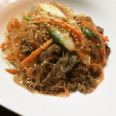 A picture of Japchae (Korean Cellophane Noodle Stir-fry).
