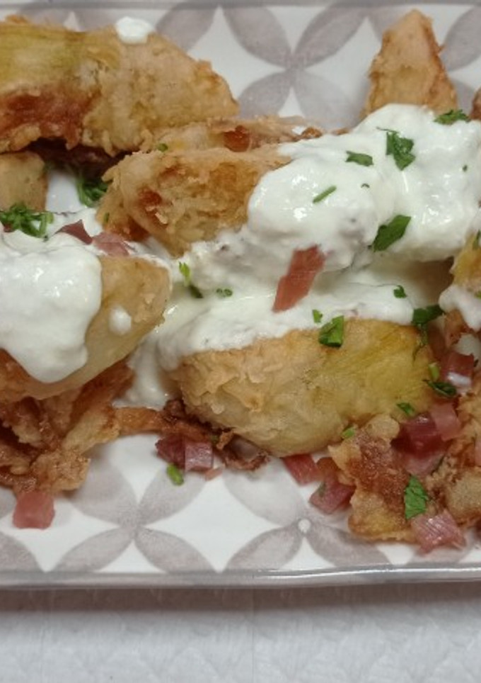 Una foto de Alcachofas con queso y jamón