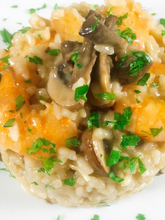 Una foto de Risotto de champiñones Portobellos y langostinos