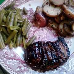 A picture of Bacon Wrapped Bacon Fried BBQ'D Pork Chops.