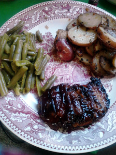 A picture of Bacon Wrapped Bacon Fried BBQ'D Pork Chops.