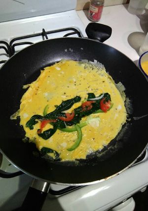 Una foto de Omelette espinacas con papas