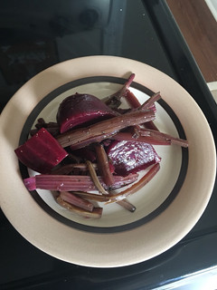 A picture of Beet salad with a vinaigrette.