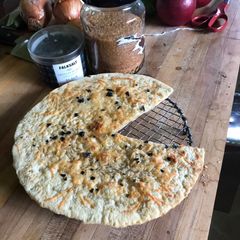 A picture of Zucchero e pepe pizza.