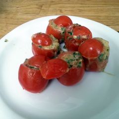A picture of cheesy babytomatoes.