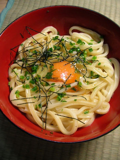 A picture of Hot Udon Noodles with Raw Egg.