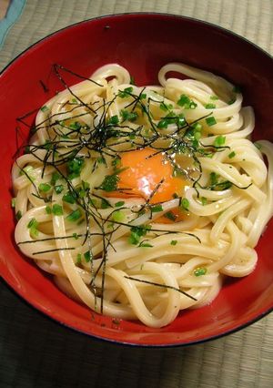 A picture of Hot Udon Noodles with Raw Egg.