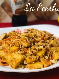 A picture of Fried yam in egg sauce.