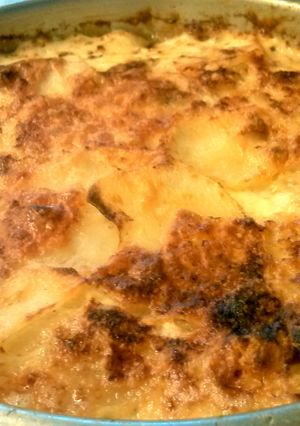A picture of Potatoes Dauphinoise- Bomb Cheesey Baked Potatoes!.