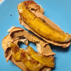 Grilled banana and peanut butter toast A picture of Grilled banana and peanut butter toast.