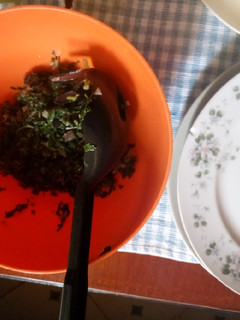 A picture of Kanzira and spinach.