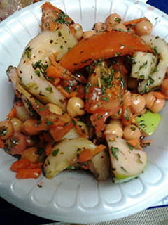 A picture of Chunky salad with Raspberry walnut vinegrette dressing.
