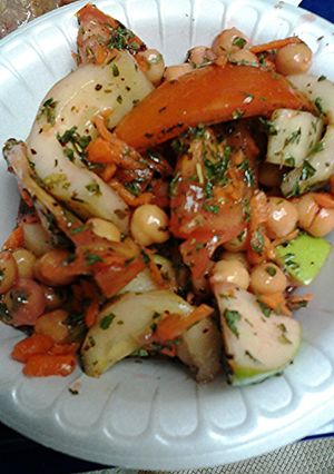 A picture of Chunky salad with Raspberry walnut vinegrette dressing.