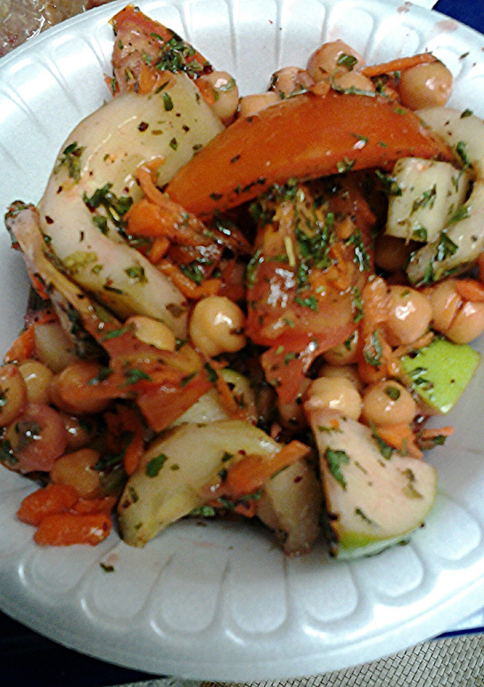 A picture of Chunky salad with Raspberry walnut vinegrette dressing.