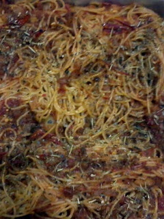 A picture of beef and tomato spaggheti.