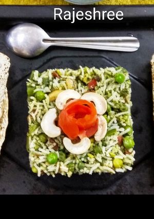 A picture of Veg Pulao With Green Masala.