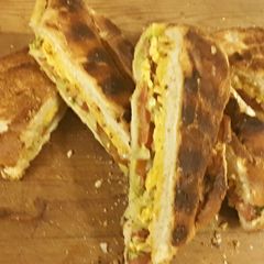 A picture of Oval Cheese and Tomato Braai Bread.