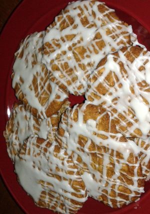 A picture of oatmeal cookies with icing.