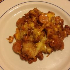 Taisen's chili cheese hot dog w/tots A picture of Taisen's chili cheese hot dog w/tots.