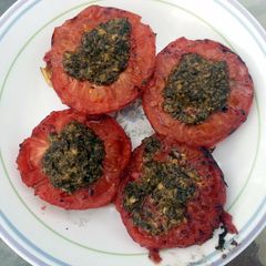 A picture of Grilled pesto tomatoes.
