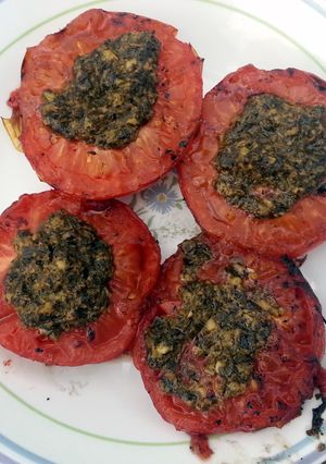 A picture of Grilled pesto tomatoes.