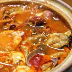 A picture of Sundubu Jjigae (Korean Soft Tofu Stew).