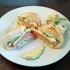 A picture of Avocado and Smoked Salmon Croissant Sandwich.