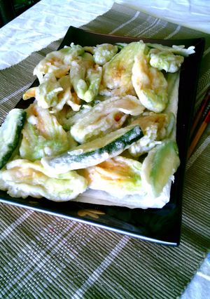 A picture of zucchini blossoms in tempura.