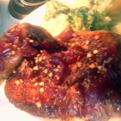 A picture of cranberrie baked chicken.