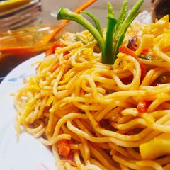 A picture of Spaghetti and meat sauce.