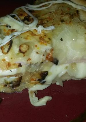 Una foto de Fugazzeta Rellena 😋😚