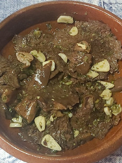 Una foto de Robellones con ajo y perejil